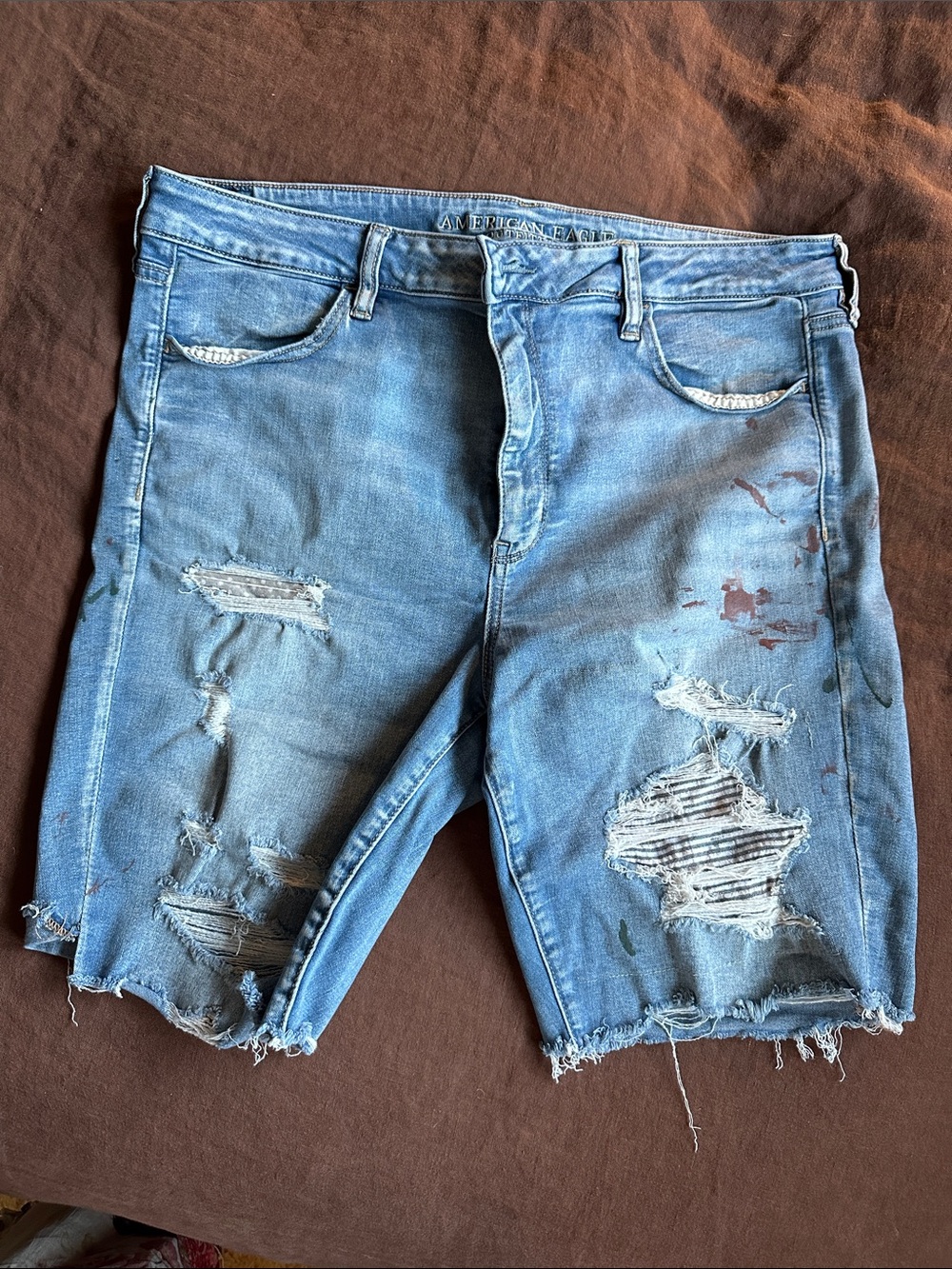 Distressed Light Blue Denim Hi Rise Jegging Shorts w paint splatter & patches